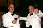 Jim Bogaty, CAS/BA '76, and his son, in the barrel room at Veramar Vineyards in Virginia.